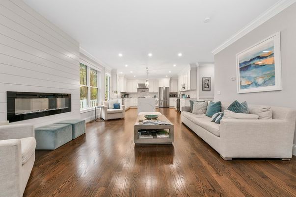 Fireplace, Interior, Kitchen, Living room, Pendant Lights, Recessed Lighting, Stainless Steel Appliances, Wood Texture Flooring