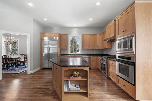 Chandelier, Dining room, Interior, Kitchen, Recessed Lighting, Stainless Steel Appliances, Wood Texture Flooring