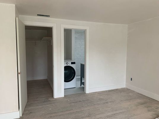 Empty room, Interior, Utility Closets, Washer, Wood Texture Flooring