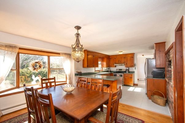 Dining room, Interior, Kitchen, Pendant Lights, Stainless Steel Appliances, Wood Texture Flooring