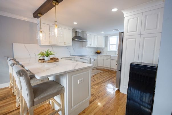 Interior, Kitchen, Marble Walls, Pendant Lights, Recessed Lighting, Wood Texture Flooring