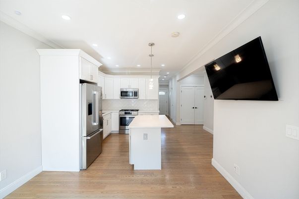 Interior, Kitchen, Pendant Lights, Recessed Lighting, Stainless Steel Appliances, Wood Texture Flooring