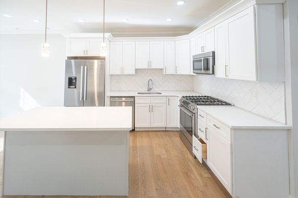 Interior, Kitchen, Pendant Lights, Recessed Lighting, Stainless Steel Appliances, Wood Texture Flooring
