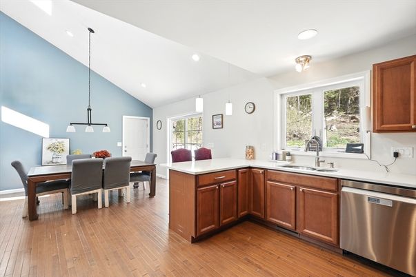 Dining room, Interior, Kitchen, Pendant Lights, Recessed Lighting, Stainless Steel Appliances, Wood Texture Flooring