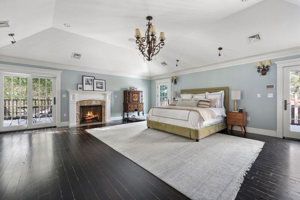 Bedroom, Chandelier, Fireplace, Interior, Recessed Lighting, Wood Texture Flooring