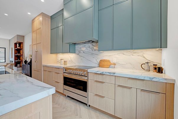 Interior, Kitchen, Marble Walls, Recessed Lighting, Stainless Steel Appliances, Wood Texture Flooring