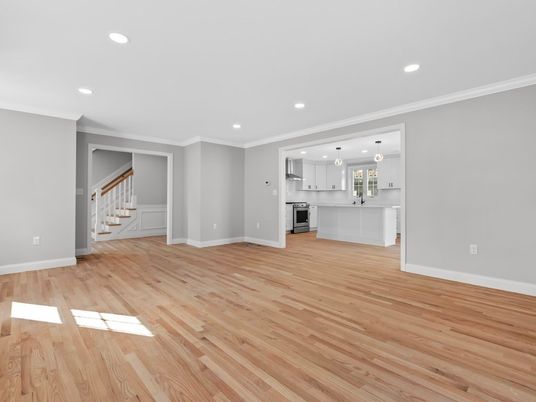Empty room, Interior, Kitchen, Pendant Lights, Recessed Lighting, Stainless Steel Appliances, Wood Texture Flooring