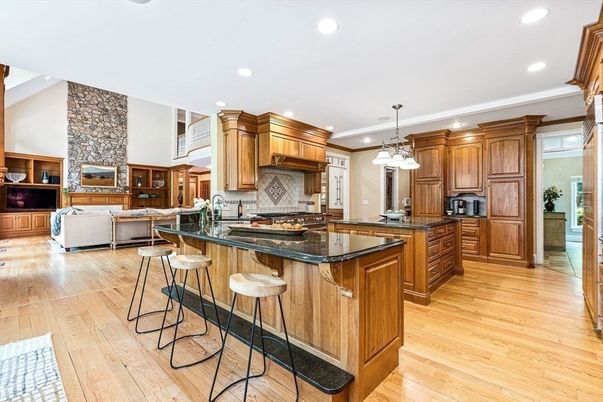 Fireplace, Interior, Kitchen, Living room, Pendant Lights, Recessed Lighting, Stone Walls, Wood Texture Flooring
