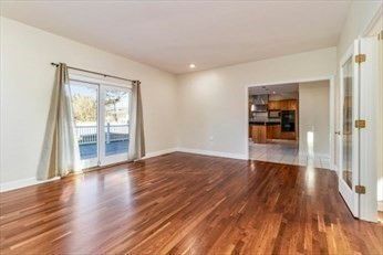 Empty room, Interior, Kitchen, Recessed Lighting, Stainless Steel Appliances, Wood Texture Flooring