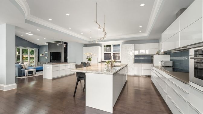 Chandelier, Interior, Kitchen, Living room, Pendant Lights, Recessed Lighting, Stainless Steel Appliances, Wood Texture Flooring