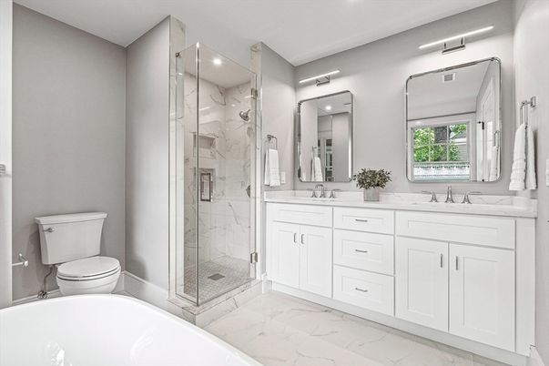 Bathroom, Dual Sink Vanities, Glass Shower, Interior, Marble, Marble Walls, Recessed Lighting