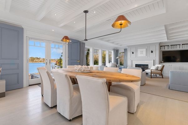 Dining room, Fireplace, Interior, Living room, Pendant Lights, Recessed Lighting, Water, Wood Texture Flooring
