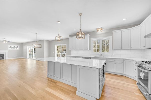 Fireplace, Interior, Kitchen, Pendant Lights, Recessed Lighting, Stainless Steel Appliances, Wood Texture Flooring