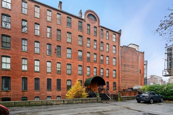 Exterior, Facade, Brick Facade, Condo Building