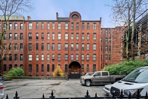 Exterior, Facade, Brick Facade, Condo Building