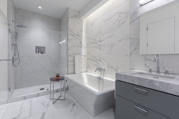 Bathroom, Free Standing Baths, Glass Shower, Interior, Marble, Marble Walls, Recessed Lighting