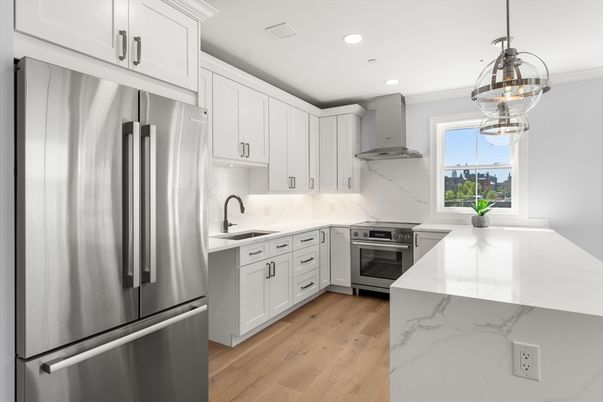 Interior, Kitchen, Marble Walls, Pendant Lights, Recessed Lighting, Stainless Steel Appliances, Wood Texture Flooring