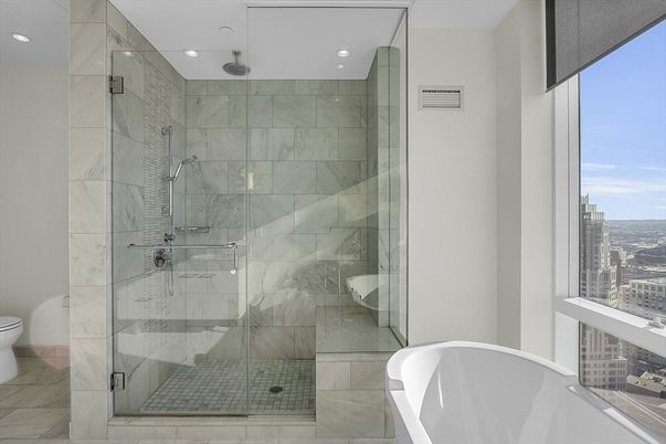 Bathroom, Free Standing Baths, Glass Shower, Interior, Marble Walls, Recessed Lighting