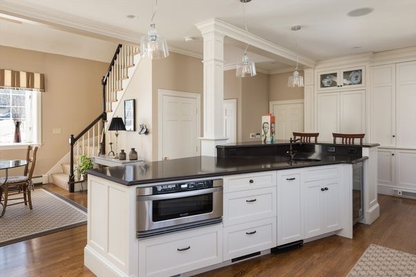 Dining room, Interior, Kitchen, Pendant Lights, Recessed Lighting, Stainless Steel Appliances, Wood Texture Flooring