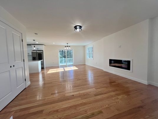 Empty room, Fireplace, Interior, Kitchen, Pendant Lights, Wood Texture Flooring