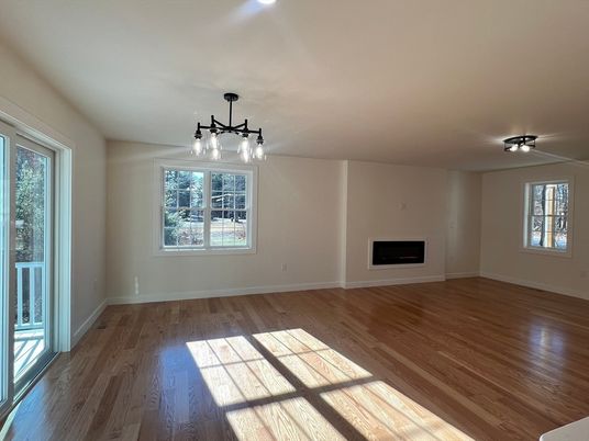 Empty room, Fireplace, Interior, Pendant Lights, Wood Texture Flooring