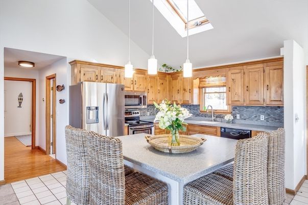 Dining room, Interior, Kitchen, Pendant Lights, Stainless Steel Appliances, Wood Texture Flooring