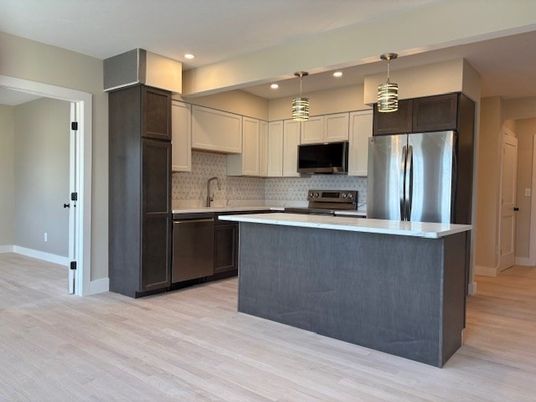 Interior, Kitchen, Pendant Lights, Recessed Lighting, Stainless Steel Appliances, Wood Texture Flooring