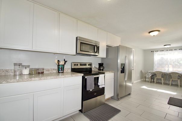 Dining room, Interior, Kitchen, Stainless Steel Appliances, Wood Texture Flooring