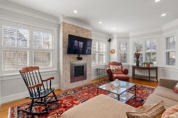 Fireplace, Interior, Living room, Recessed Lighting, Stone Walls, Wood Texture Flooring