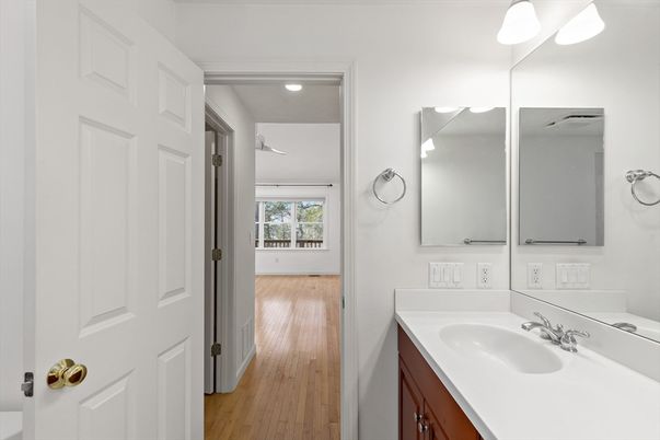 Bathroom, Dual Sink Vanities, Interior, Recessed Lighting, Wood Texture Flooring
