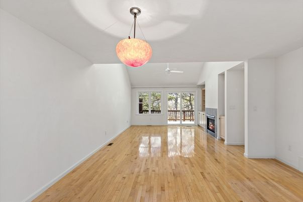 Empty room, Fireplace, Interior, Pendant Lights, Wood Texture Flooring