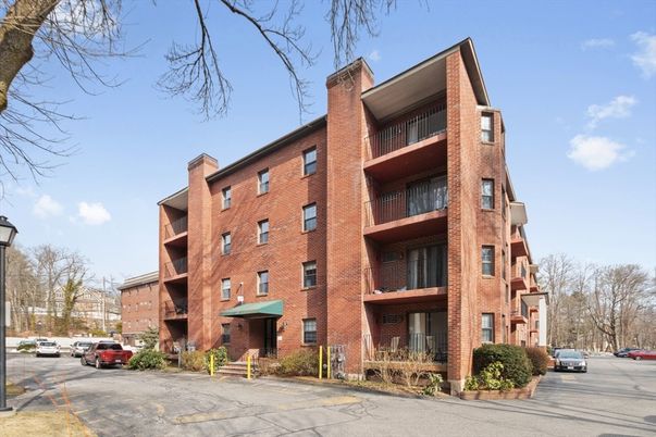Exterior, Facade, Brick Facade, Condo Building