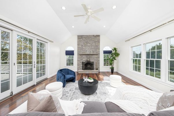 Fireplace, Interior, Living room, Recessed Lighting, Stone Walls, Wood Texture Flooring