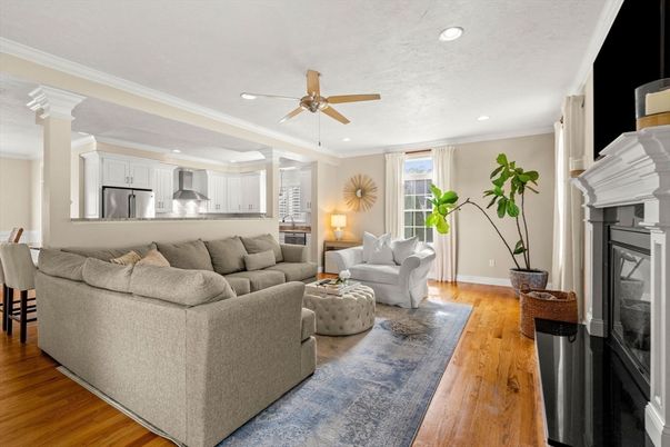 Fireplace, Interior, Kitchen, Living room, Recessed Lighting, Stainless Steel Appliances, Wood Texture Flooring