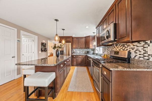 Interior, Kitchen, Pendant Lights, Recessed Lighting, Stainless Steel Appliances, Wood Texture Flooring