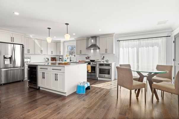 Dining room, Interior, Kitchen, Pendant Lights, Recessed Lighting, Stainless Steel Appliances, Wood Texture Flooring