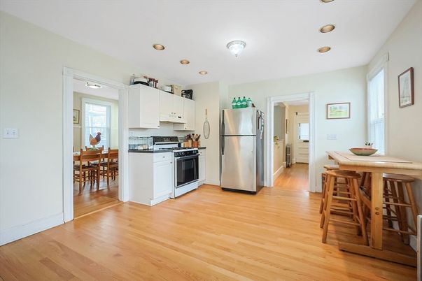 Dining room, Interior, Kitchen, Recessed Lighting, Stainless Steel Appliances, Wood Texture Flooring