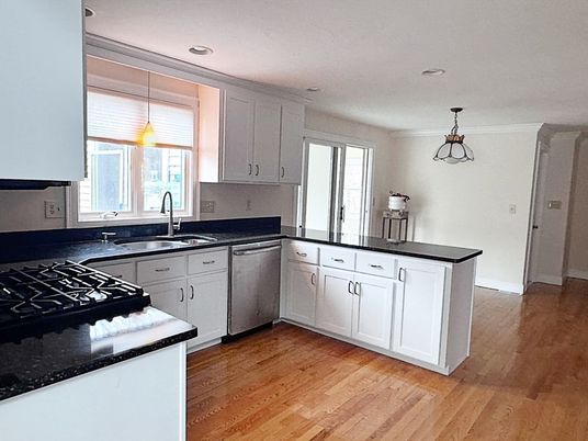 Dining room, Interior, Kitchen, Pendant Lights, Recessed Lighting, Stainless Steel Appliances, Wood Texture Flooring