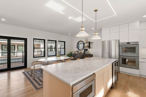 Dining room, Interior, Kitchen, Pendant Lights, Recessed Lighting, Stainless Steel Appliances, Wood Texture Flooring