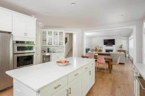 Dining room, Fireplace, Interior, Kitchen, Living room, Recessed Lighting, Stainless Steel Appliances, Wood Texture Flooring