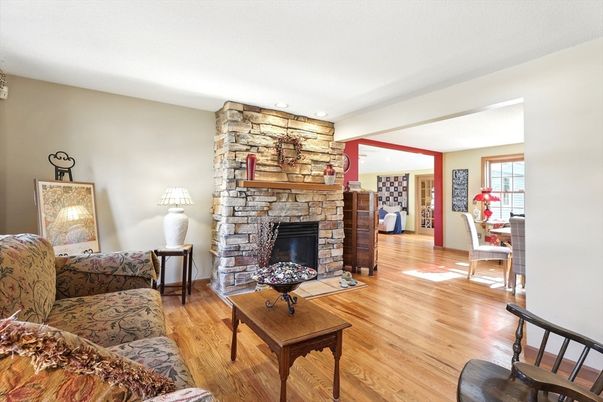 Fireplace, Interior, Living room, Recessed Lighting, Stone Walls, Wood Texture Flooring
