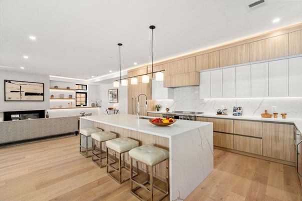 Fireplace, Interior, Kitchen, Living room, Marble Walls, Pendant Lights, Recessed Lighting, Stainless Steel Appliances, Wood Texture Flooring
