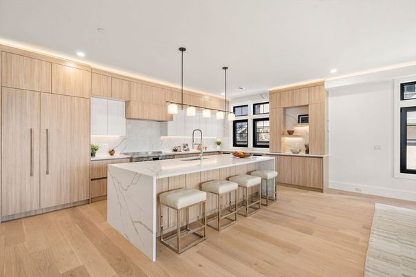 Interior, Kitchen, Marble Walls, Pendant Lights, Recessed Lighting, Stainless Steel Appliances, Wood Texture Flooring