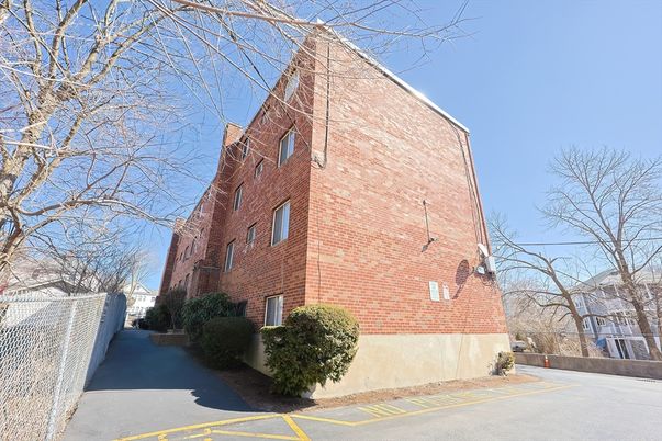 Exterior, Facade, Brick Facade, Condo Building