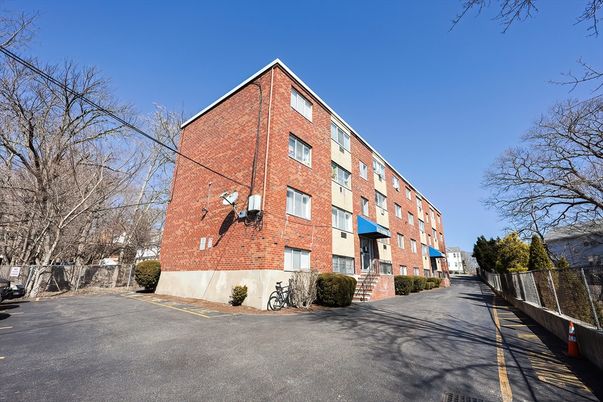 Exterior, Facade, Brick Facade, Condo Building