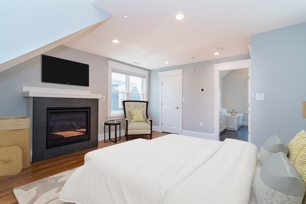 Bedroom, Fireplace, Interior, Recessed Lighting, Wood Texture Flooring