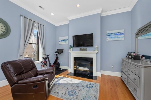 Fireplace, Fitness Equipment, Interior, Recessed Lighting, Wood Texture Flooring