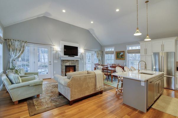 Dining room, Fireplace, Interior, Kitchen, Living room, Pendant Lights, Recessed Lighting, Stainless Steel Appliances, Wood Texture Flooring