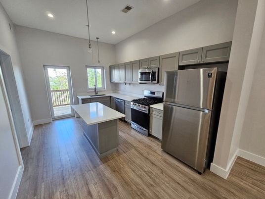 Interior, Kitchen, Pendant Lights, Recessed Lighting, Stainless Steel Appliances, Wood Texture Flooring