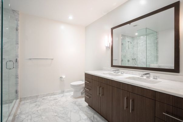 Bathroom, Dual Sink Vanities, Glass Shower, Interior, Marble, Marble Walls, Recessed Lighting